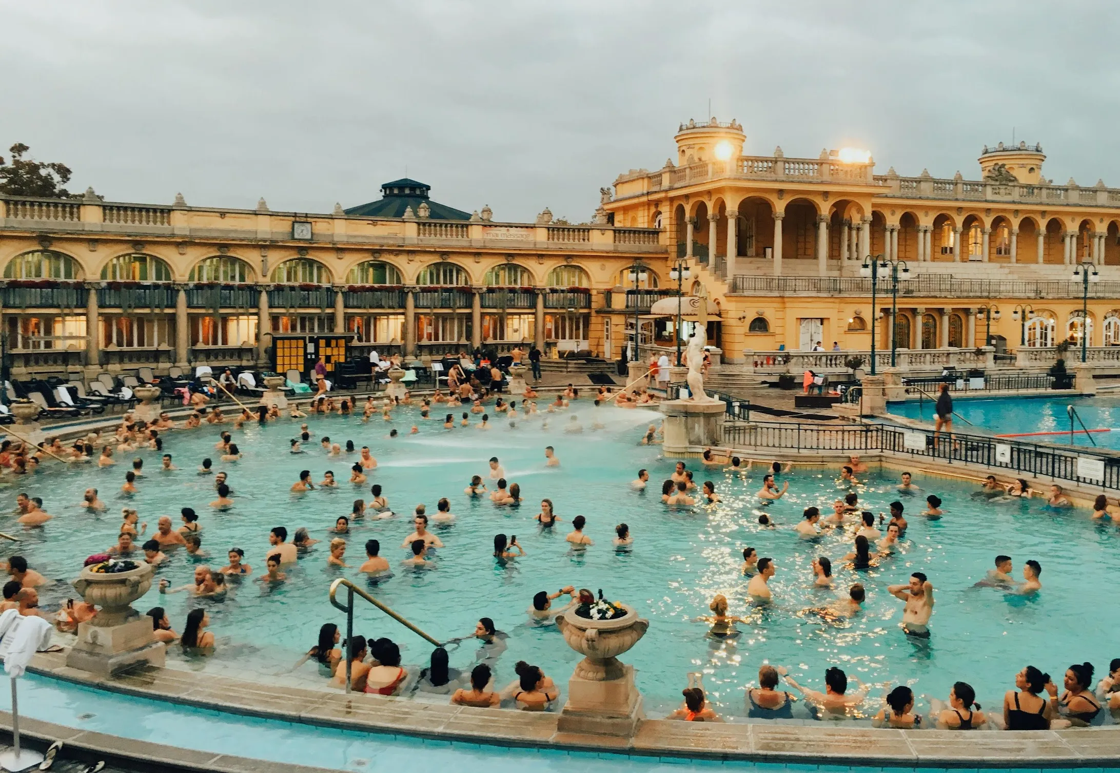 Visitors relaxing in the steaming outdoor pool at Széchenyi Baths