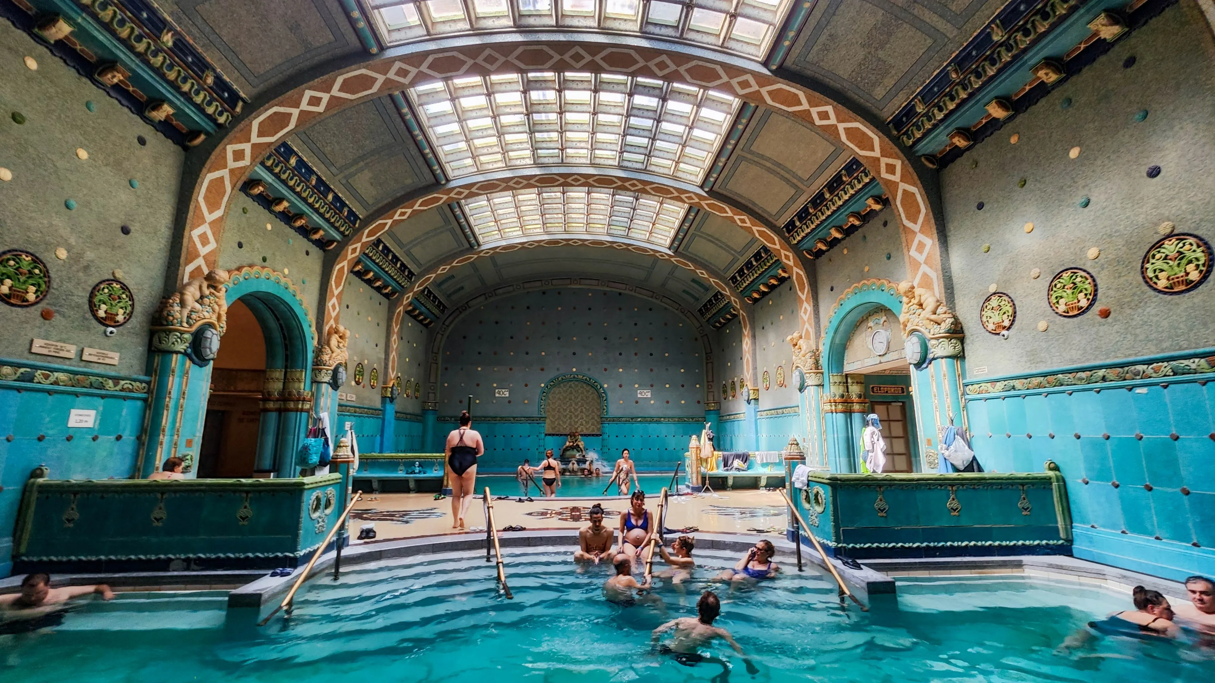 Indoor thermal pool hall with classical columns at Széchenyi Baths